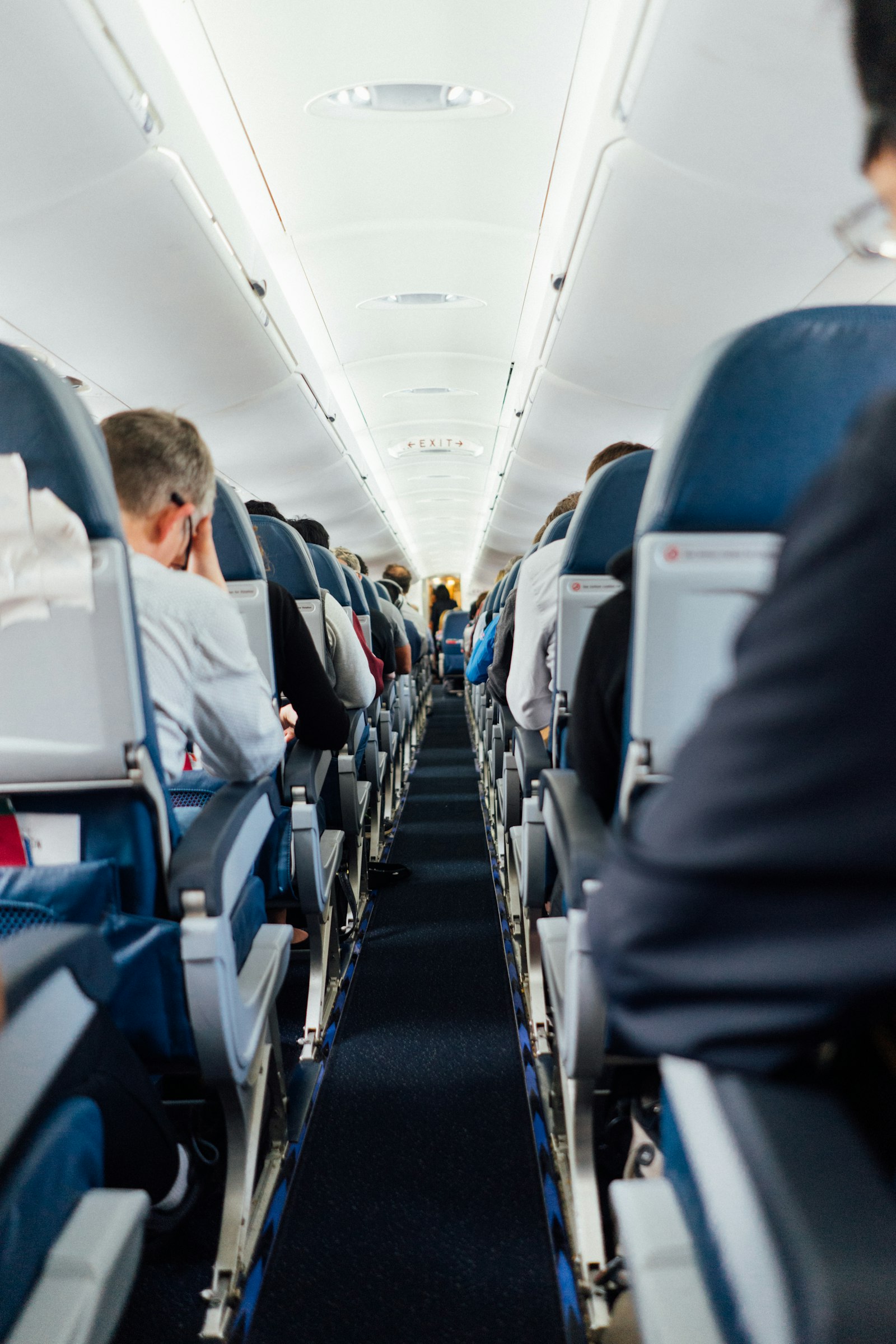 Aircraft cabin aisle during boarding