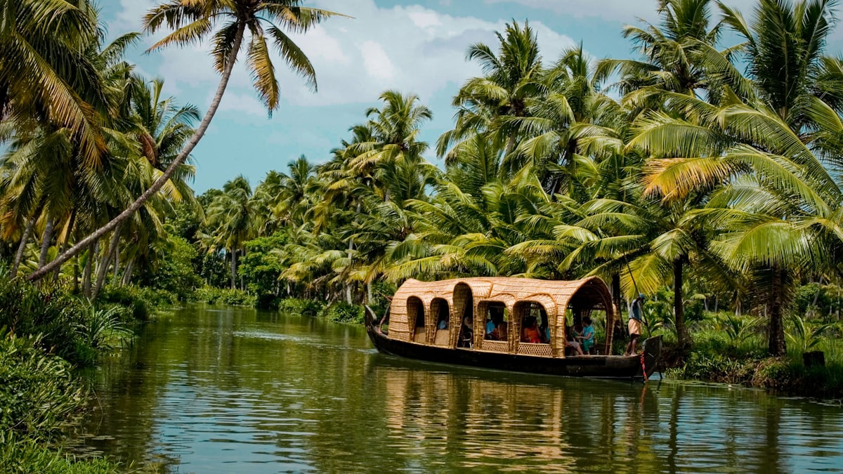 Houseboat drifting through Kerala backwaters