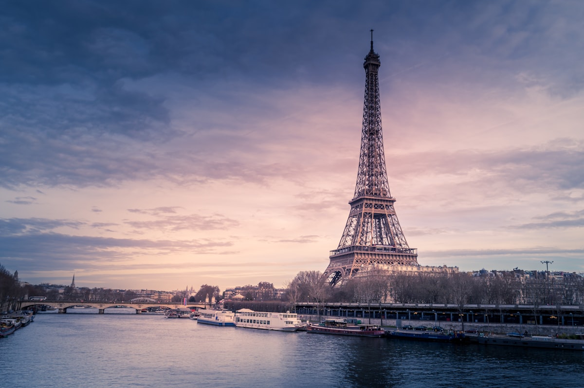 Eiffel Tower over the Seine at dusk