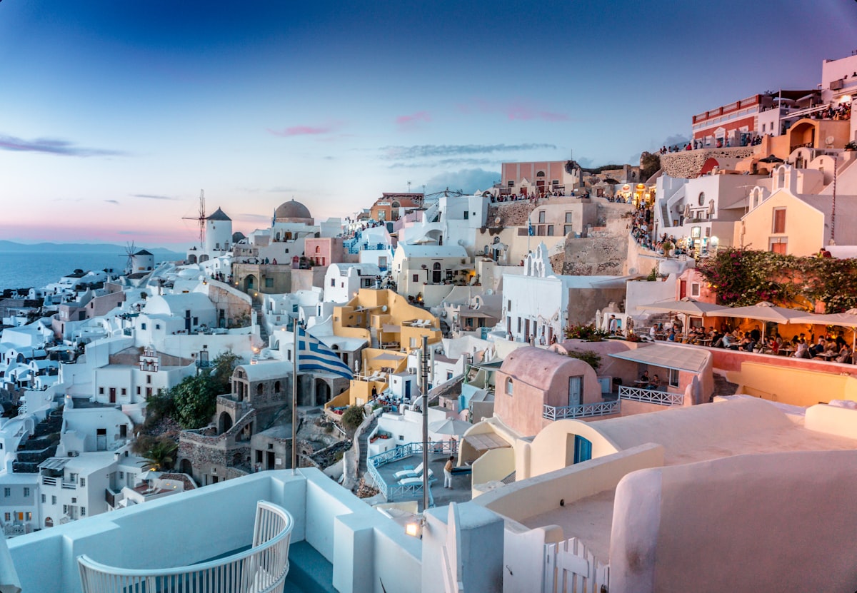 Santorini village glowing at dusk